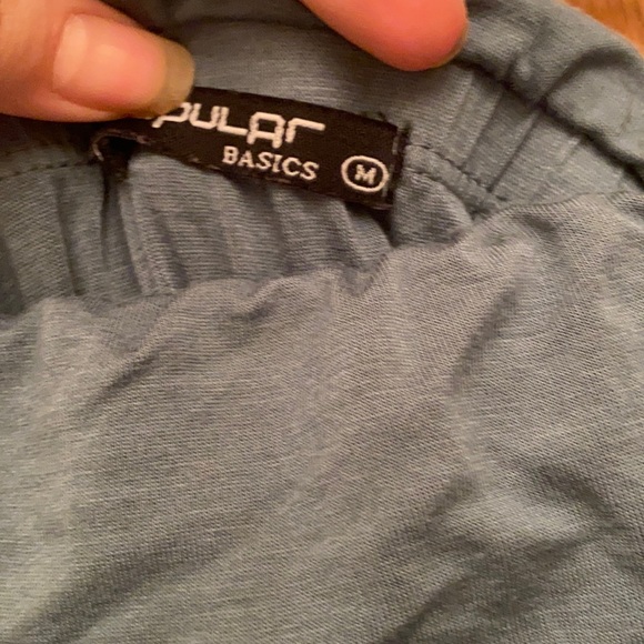 Teal colored romper with pockets and ruffled by feet to go with shoes - Picture 3 of 4